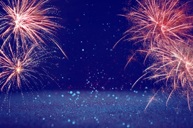 4th of July - Independence Day of USA. Festive background with fireworks and glitters, bokeh effect