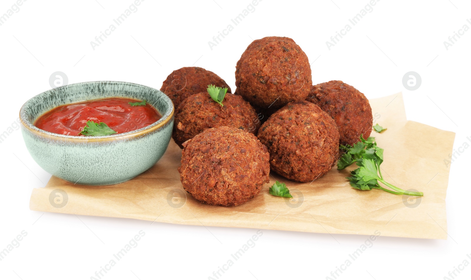 Photo of Delicious falafel balls, sauce and parsley on white background. Vegan meat products