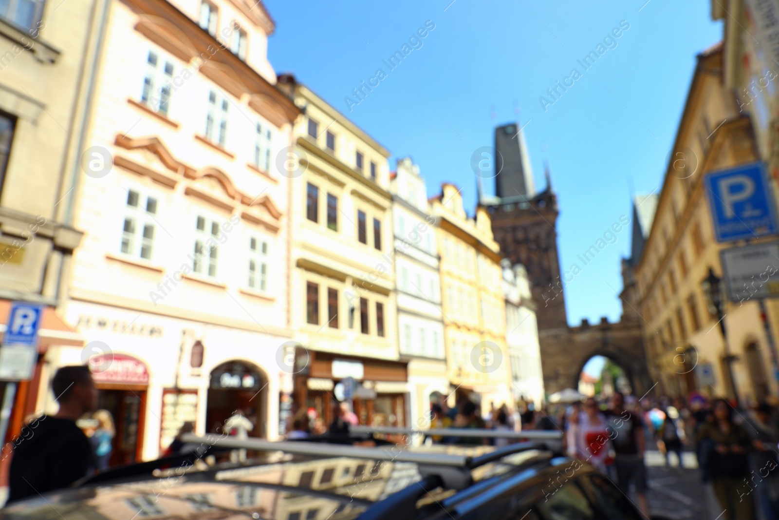 Photo of PRAGUE, CZECH REPUBLIC - APRIL 25, 2019: Blurred view of city street with old buildings