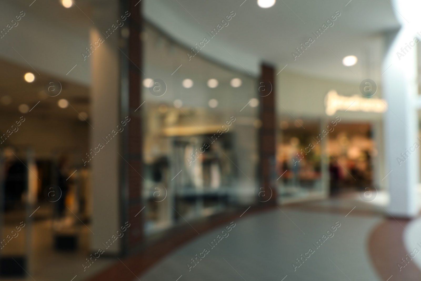 Photo of Blurred view of shopping mall interior. Bokeh effect