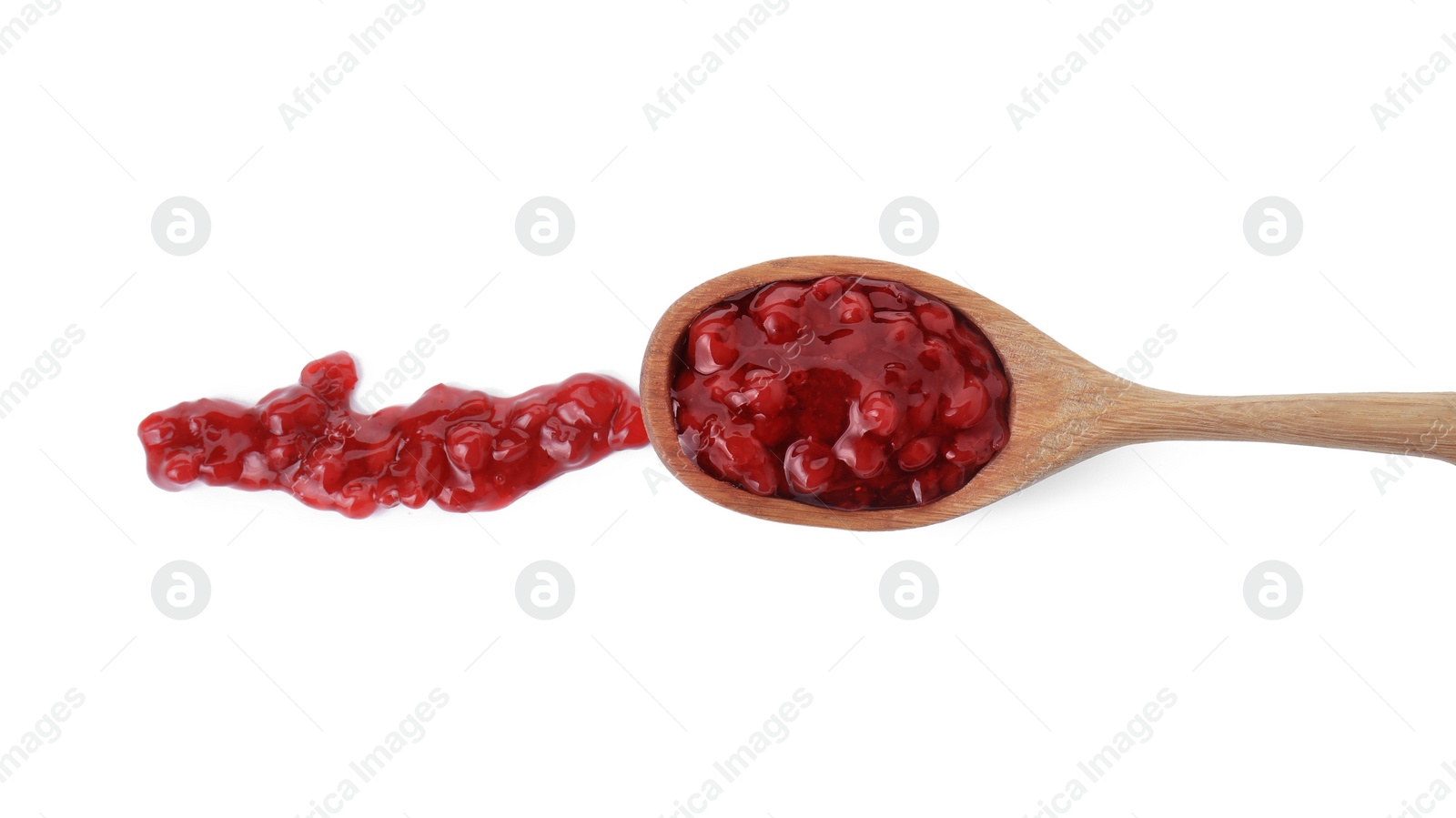 Photo of Spoon with fresh cranberry sauce isolated on white, top view