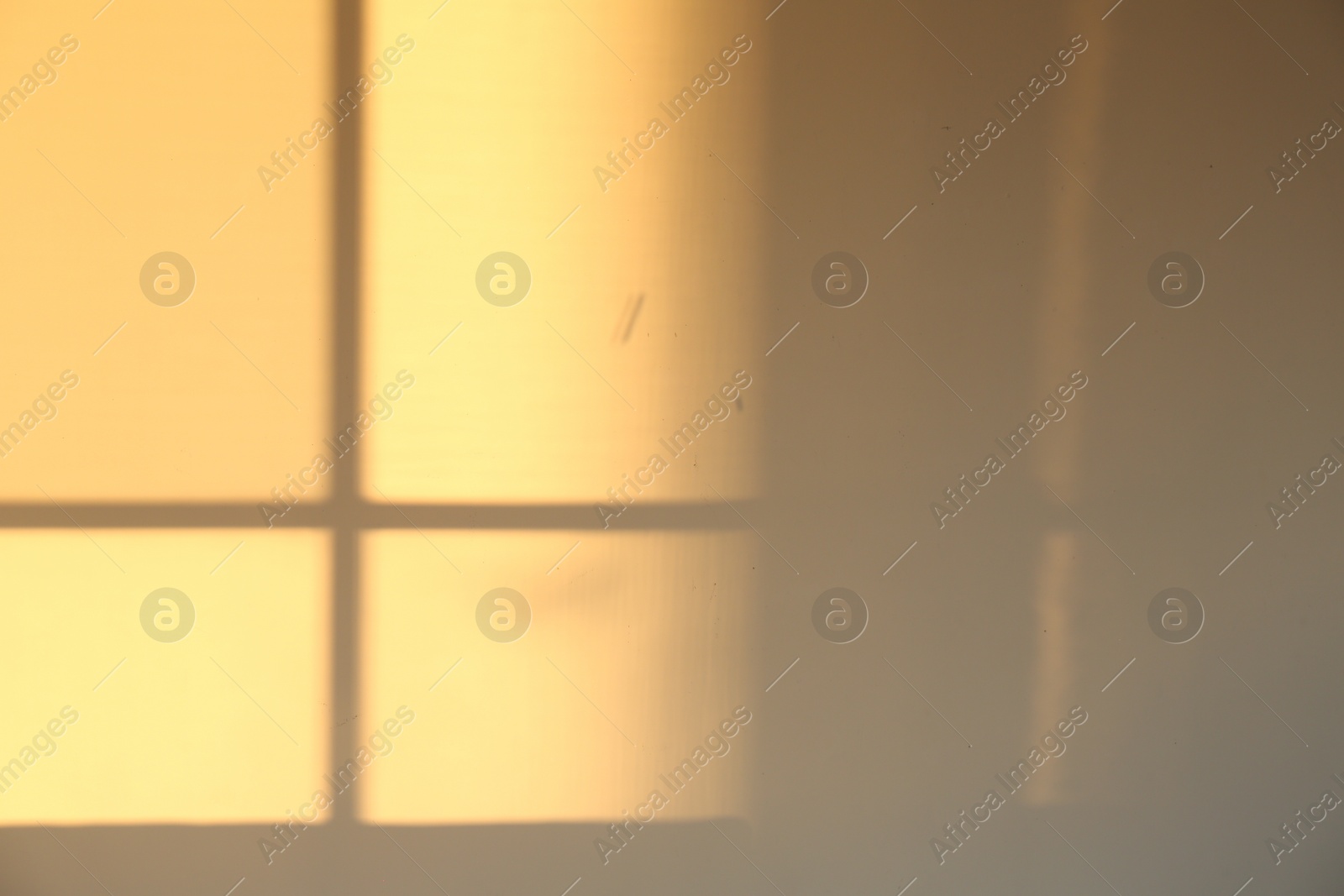 Photo of Light and shadow from window on wall