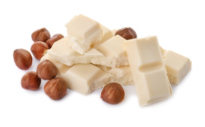 Photo of Delicious chocolate with nuts on white background