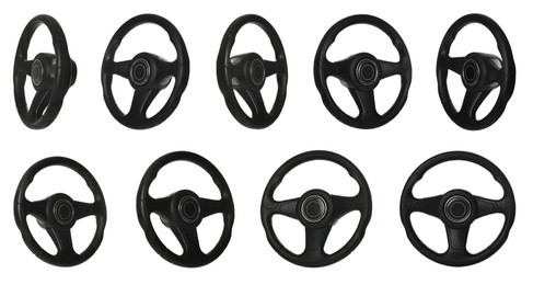 Set with black steering wheels on white background 