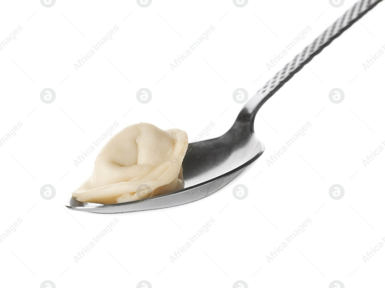 Photo of Spoon with tasty dumpling isolated on white