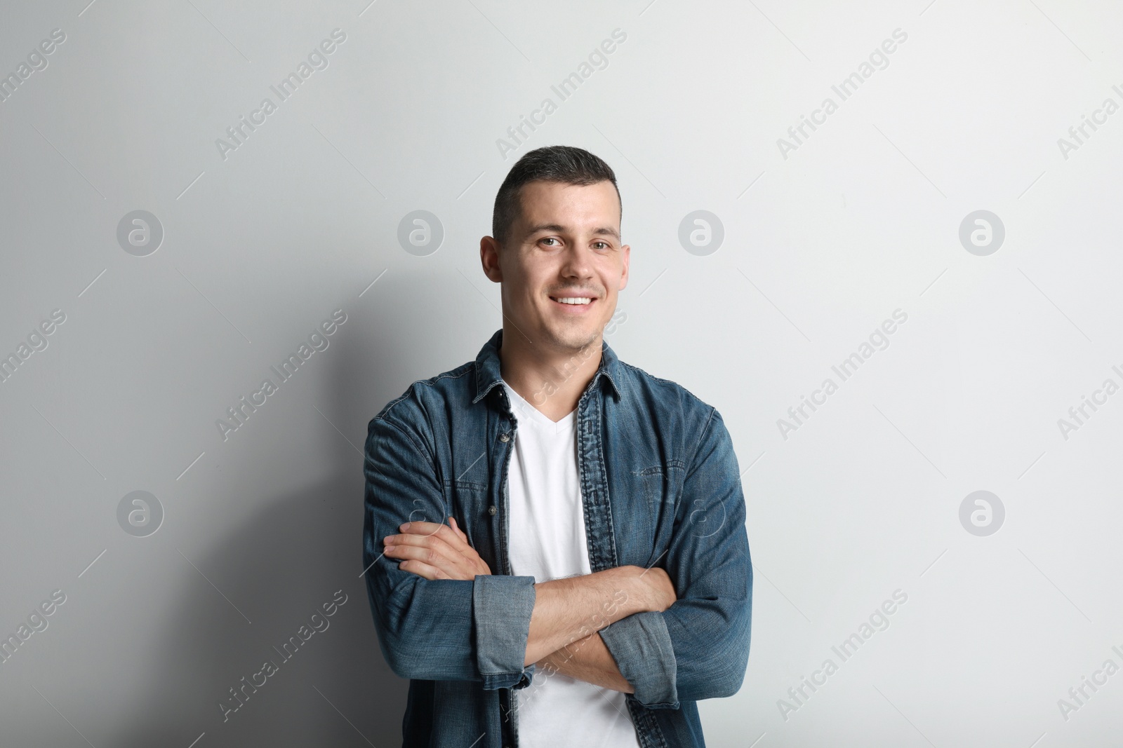 Photo of Portrait of handsome man on white background