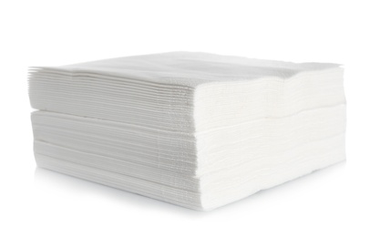 Stack of clean paper napkins on white background