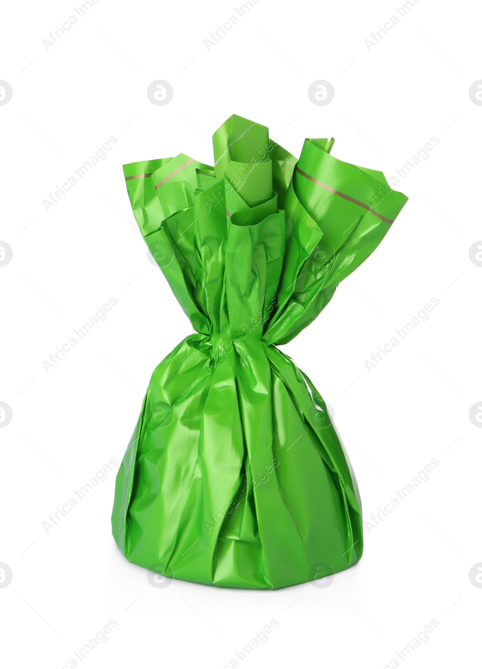 Photo of Delicious candy in green wrapper isolated on white