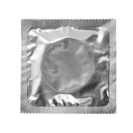 Condom package isolated on white, top view. Safe sex