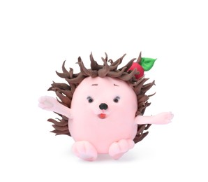 Photo of Small hedgehog made from play dough on white background