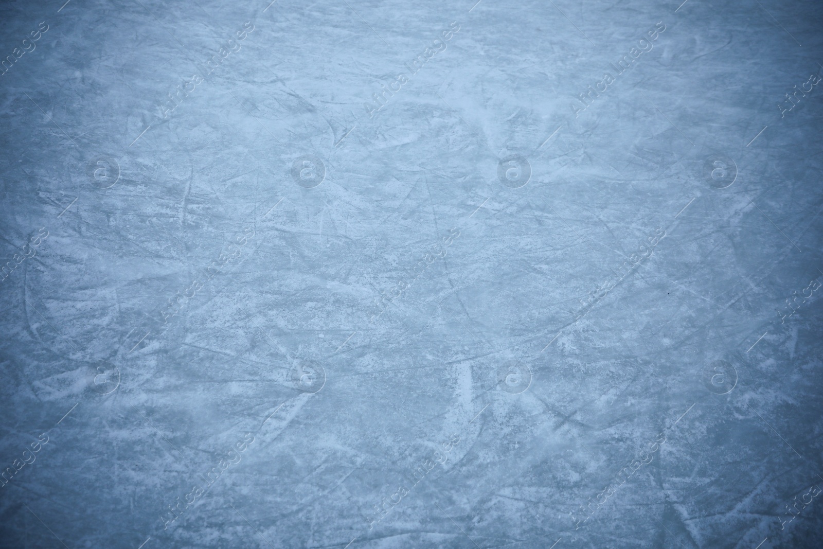 Photo of Frozen ice skating surface as background. Winter season