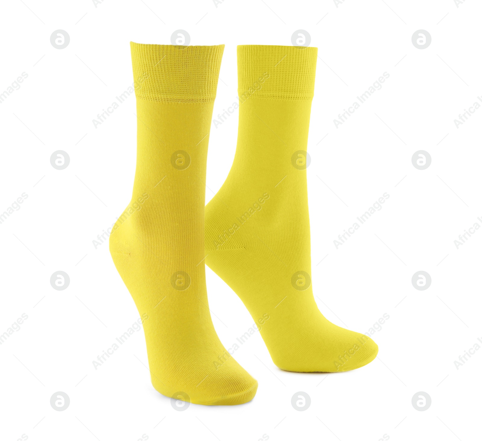 Image of Pair of bright yellow socks isolated on white