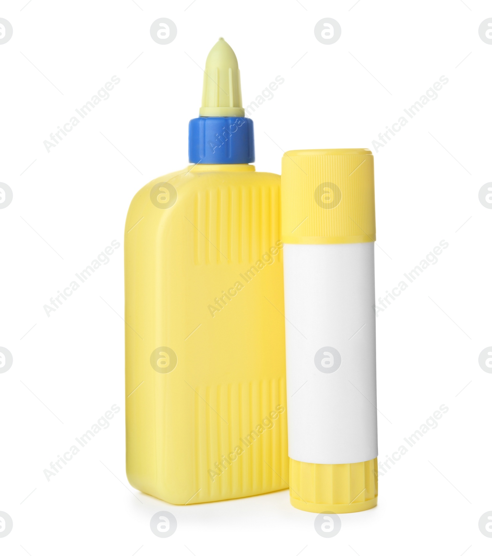 Photo of Bottle and stick of glue on white background