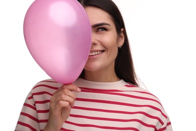Happy woman with pink balloon on white background