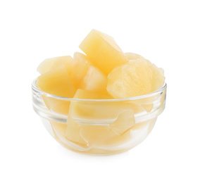 Photo of Pieces of delicious sweet canned pineapple in glass bowl on white background