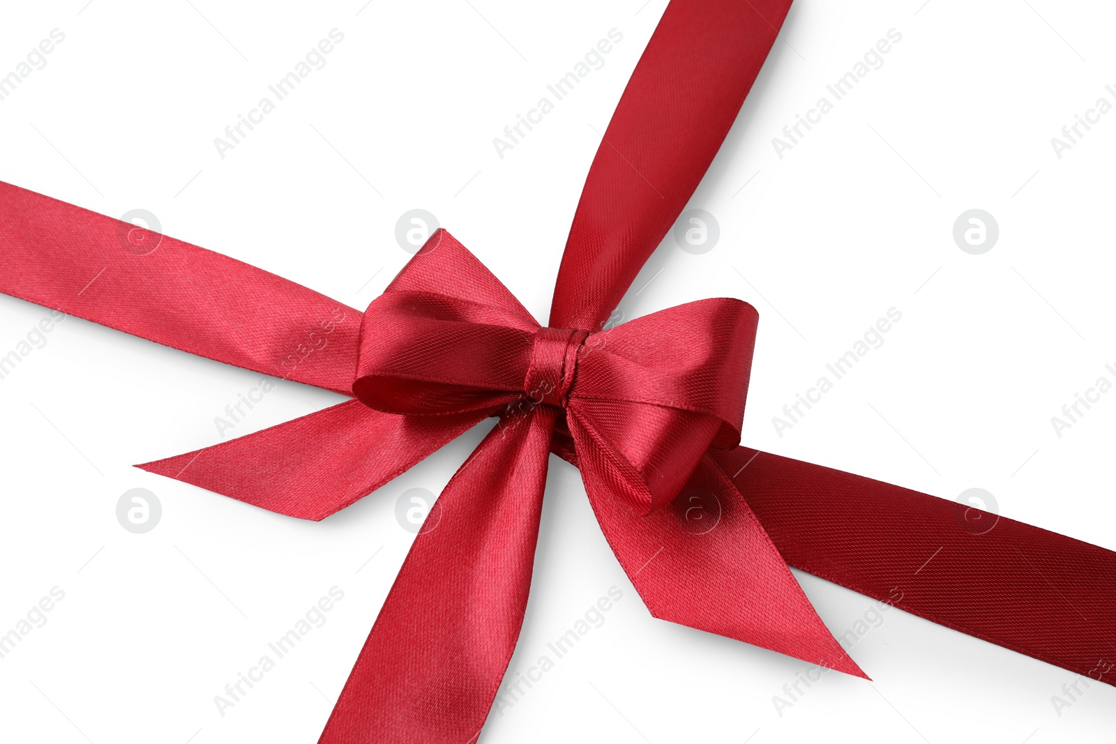 Photo of Red satin ribbon with bow on white background