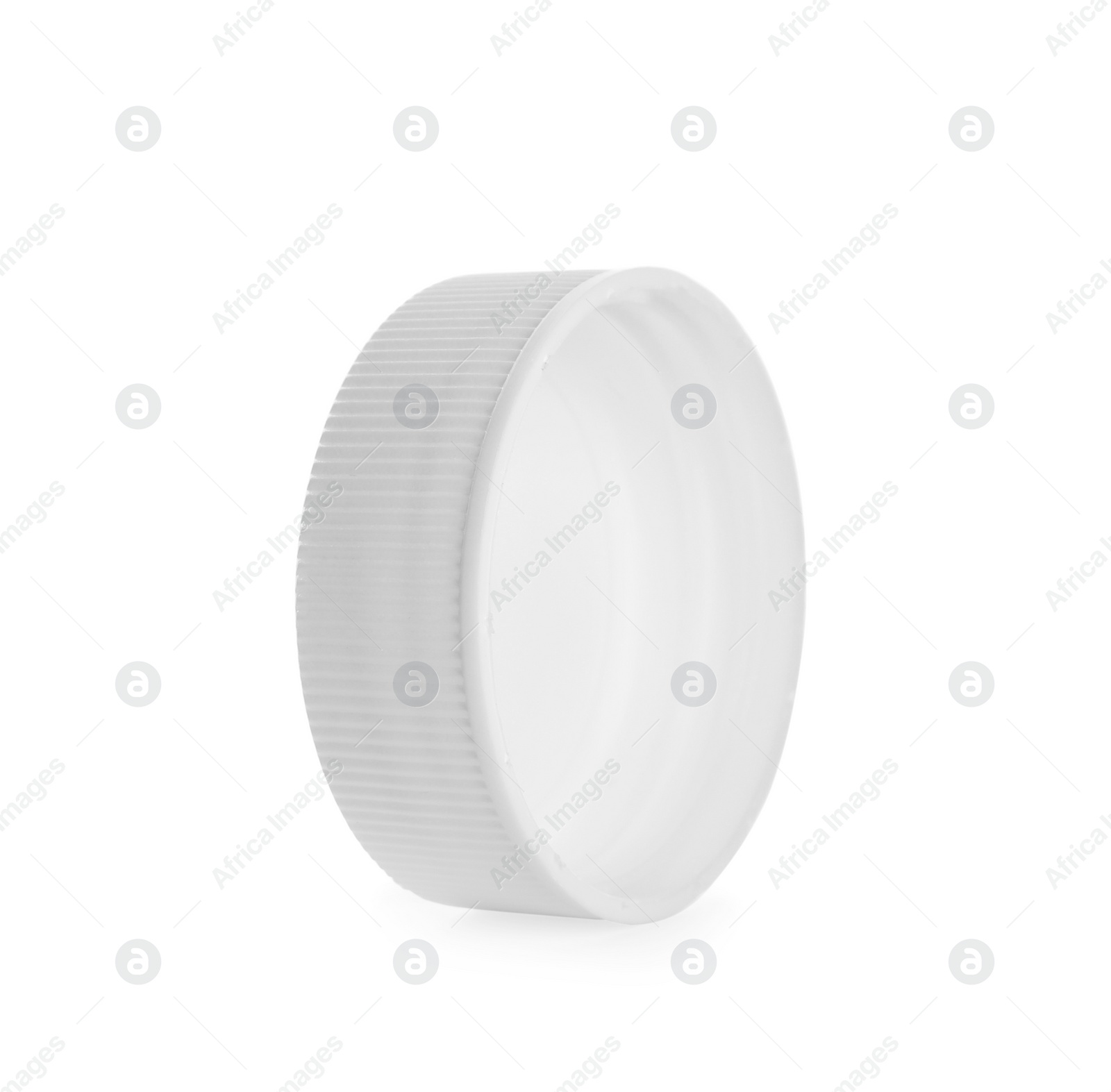 Photo of One plastic bottle cap isolated on white