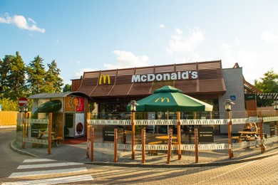 Photo of WARSAW, POLAND - SEPTEMBER 16, 2022: View of McDonald's restaurant on city street