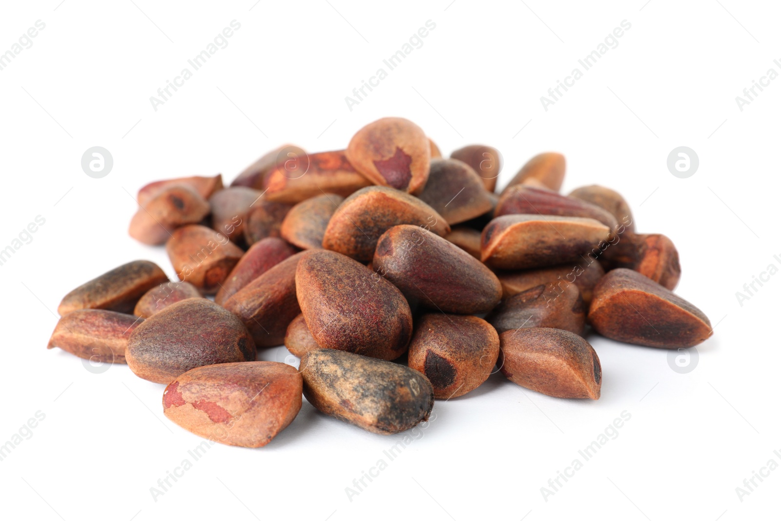 Photo of Heap of pine nuts on white background. Healthy snack
