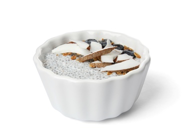 Bowl of tasty chia seed pudding with coconut, granola and blueberries on white background