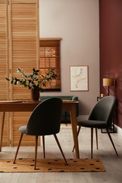 Beautiful dining room interior with new stylish furniture