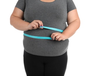 Photo of Overweight woman with measuring tape on white background, closeup