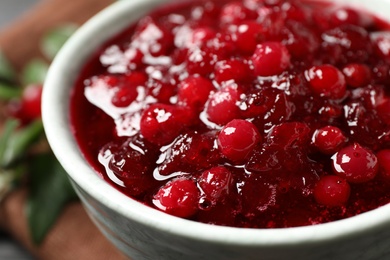 Delicious fresh cranberry sauce in bowl, closeup