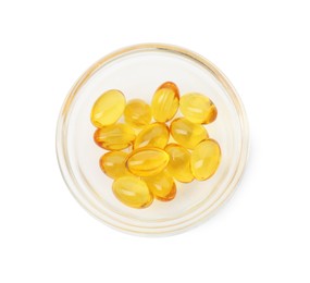 Photo of Vitamin capsules in bowl isolated on white, top view. Health supplement