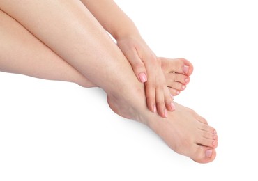 Photo of Woman with neat toenails after pedicure procedure isolated on white, closeup