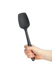 Photo of Woman with black spatula on white background, closeup