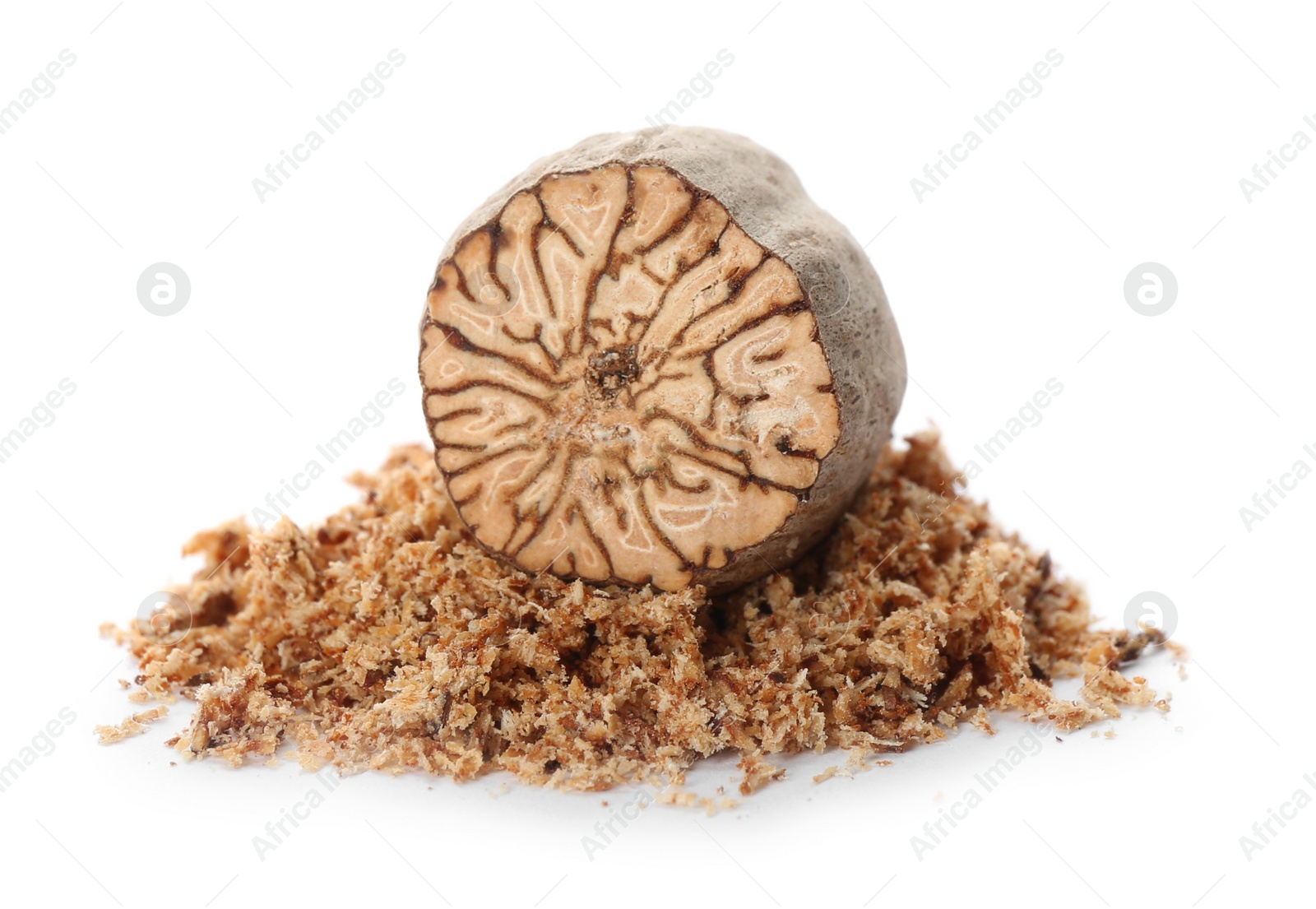 Photo of Grated nutmeg and seed isolated on white