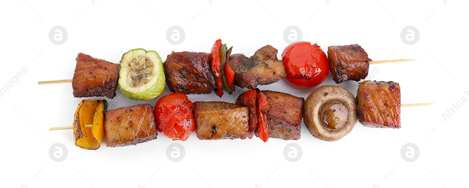 Photo of Delicious shish kebabs with vegetables isolated on white, top view