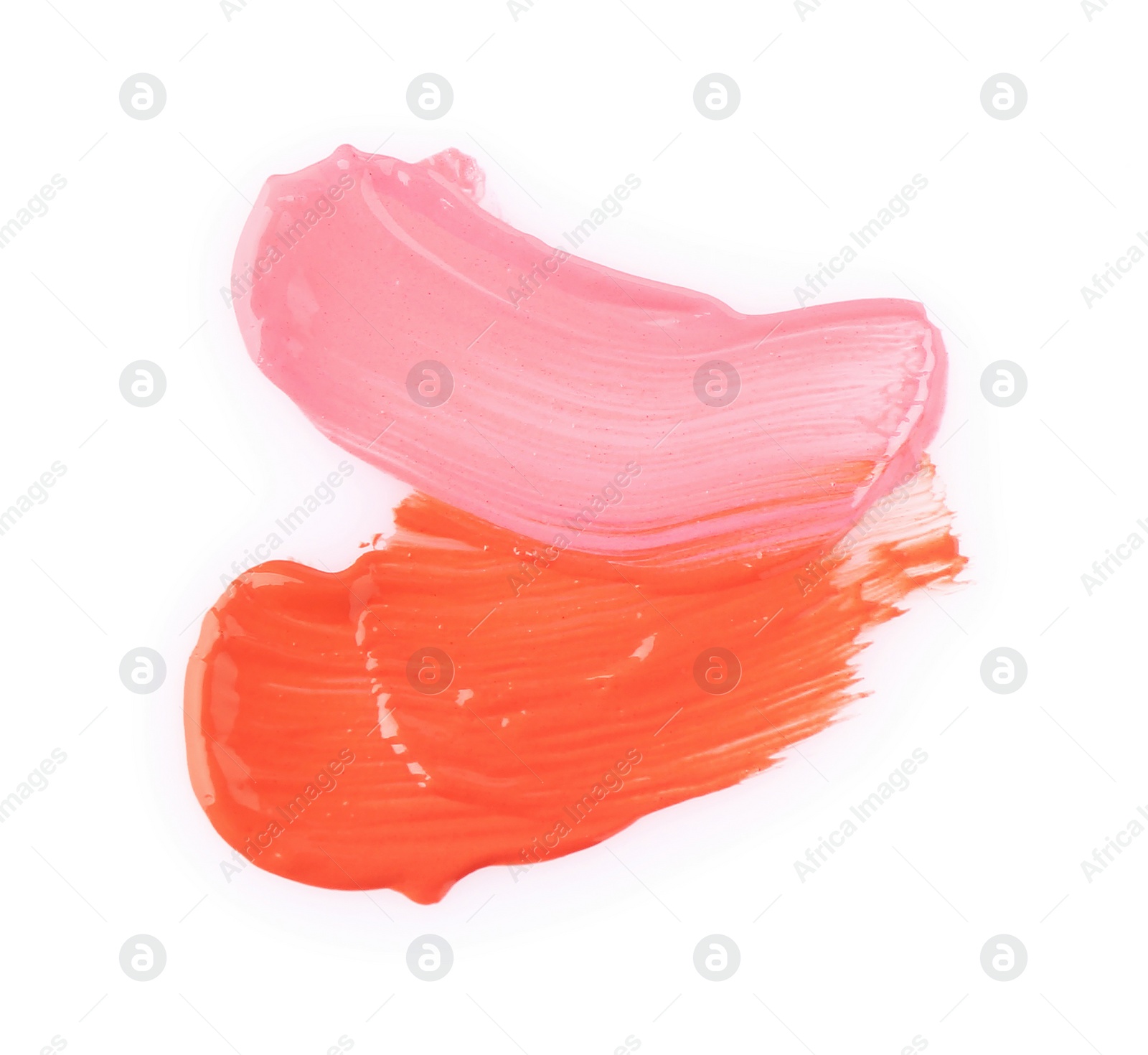 Photo of Strokes of color lip glosses isolated on white, top view