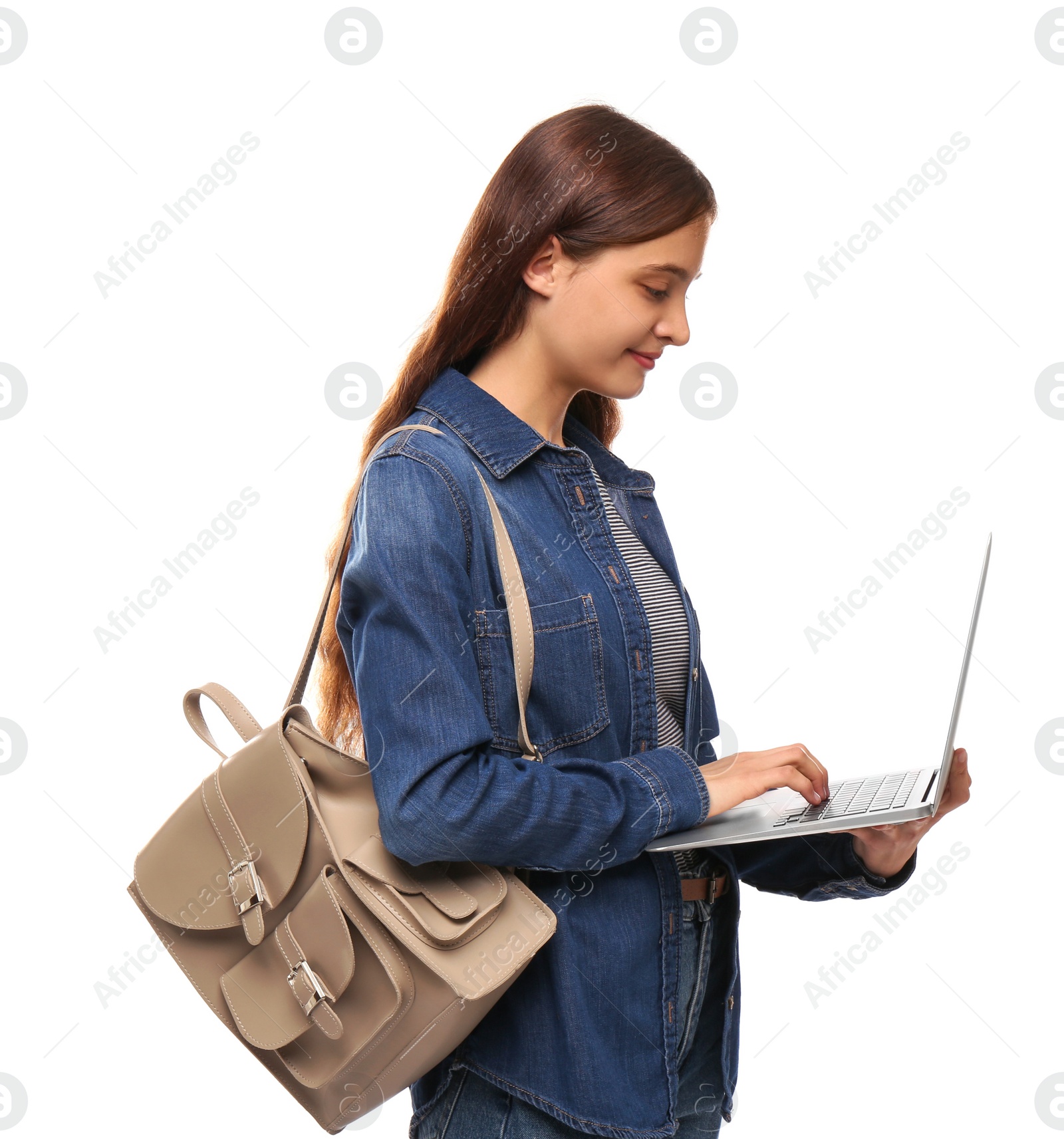 Photo of Teenage student with laptop and backpack on white background