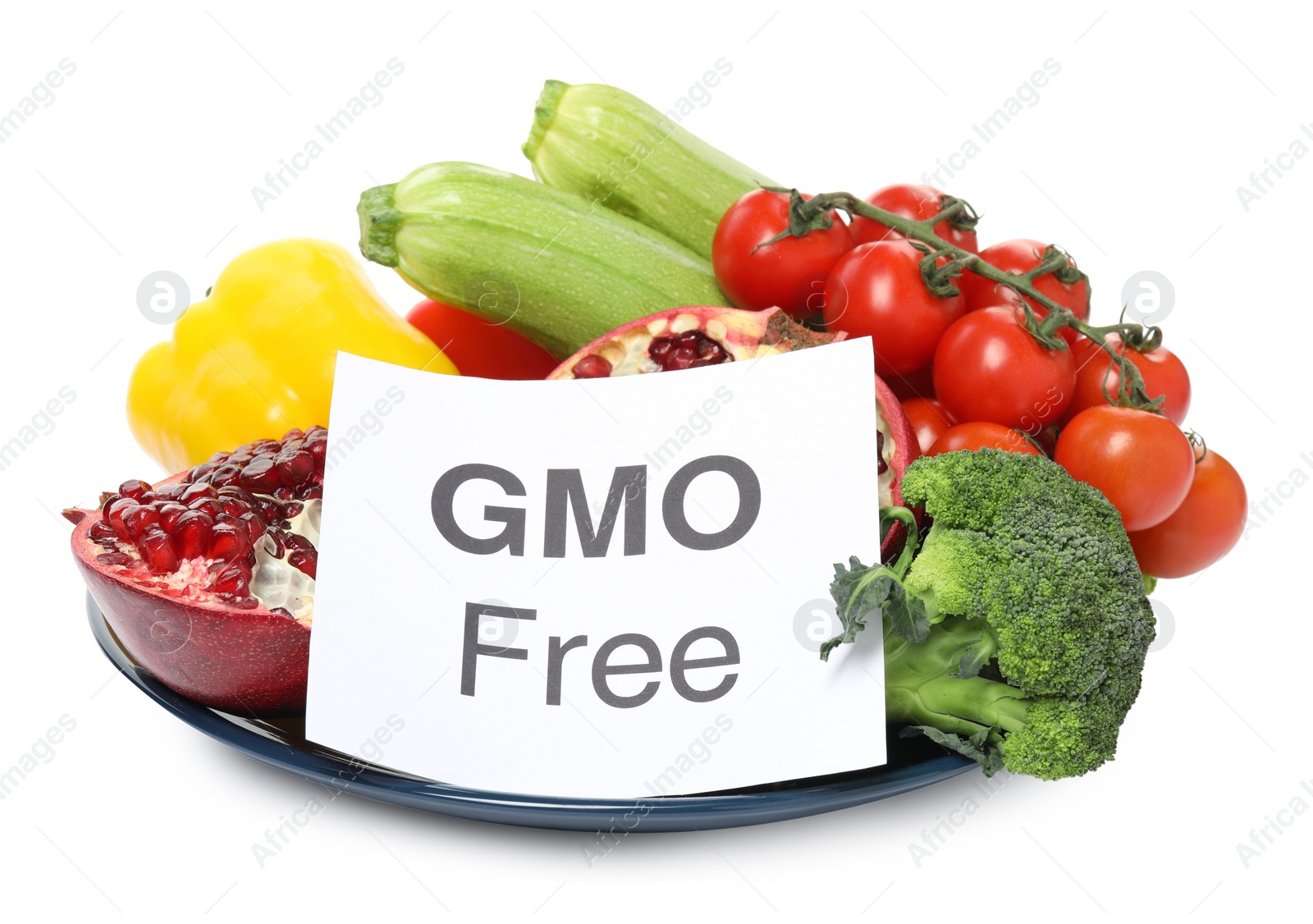 Photo of Tasty fresh GMO free products and paper card on white background