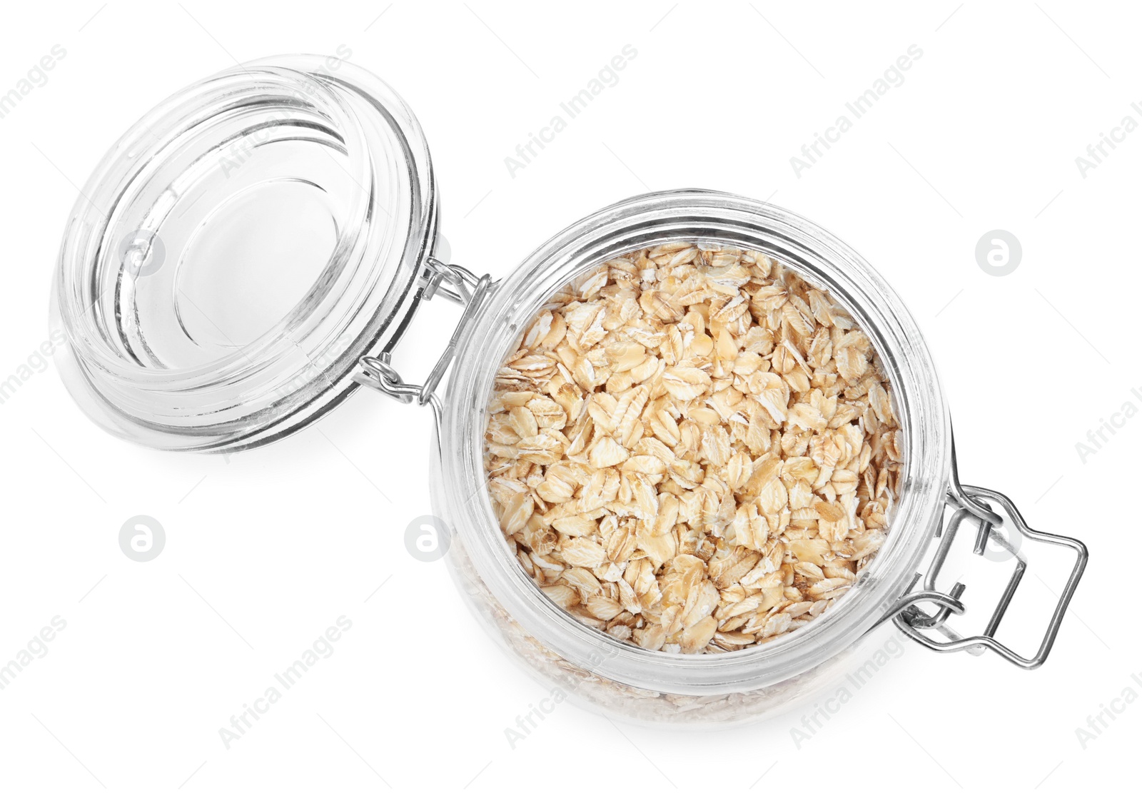 Photo of Raw oatmeal in glass jar isolated on white, top view