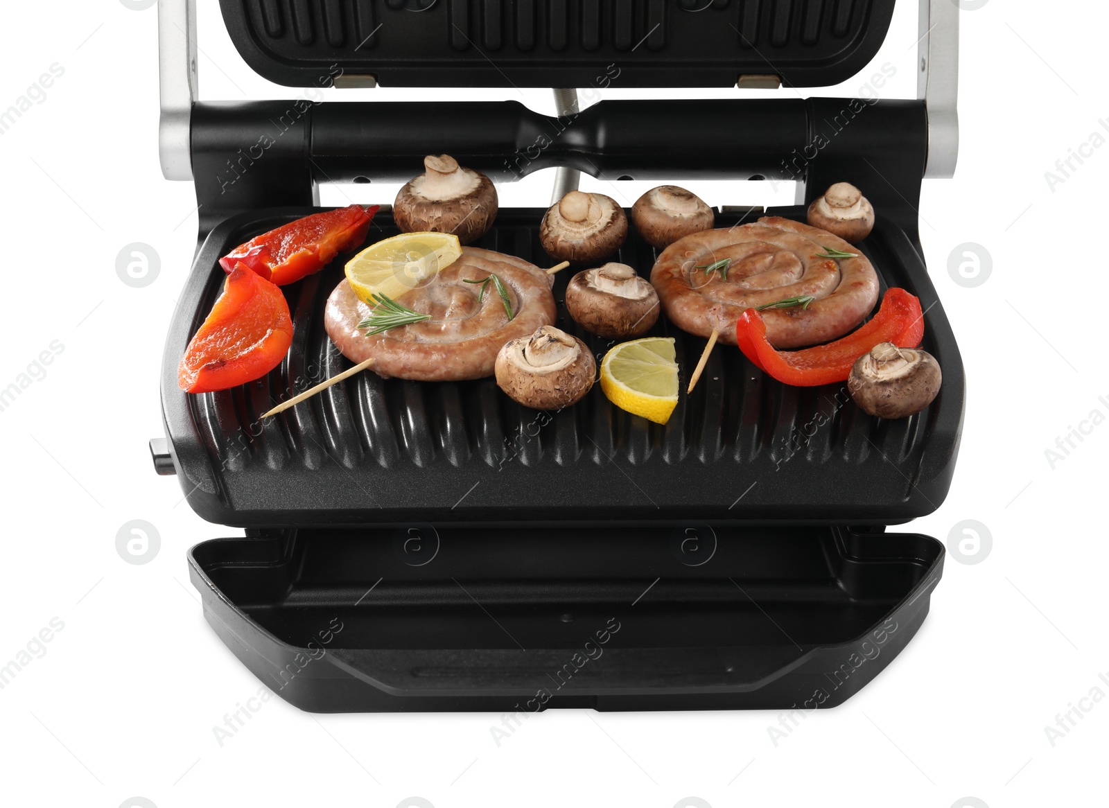 Photo of Electric grill with homemade sausages, mushrooms and bell pepper isolated on white