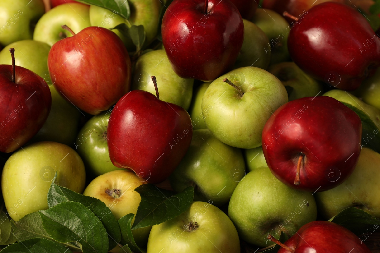 Photo of Fresh ripe red and green apples as background, top view