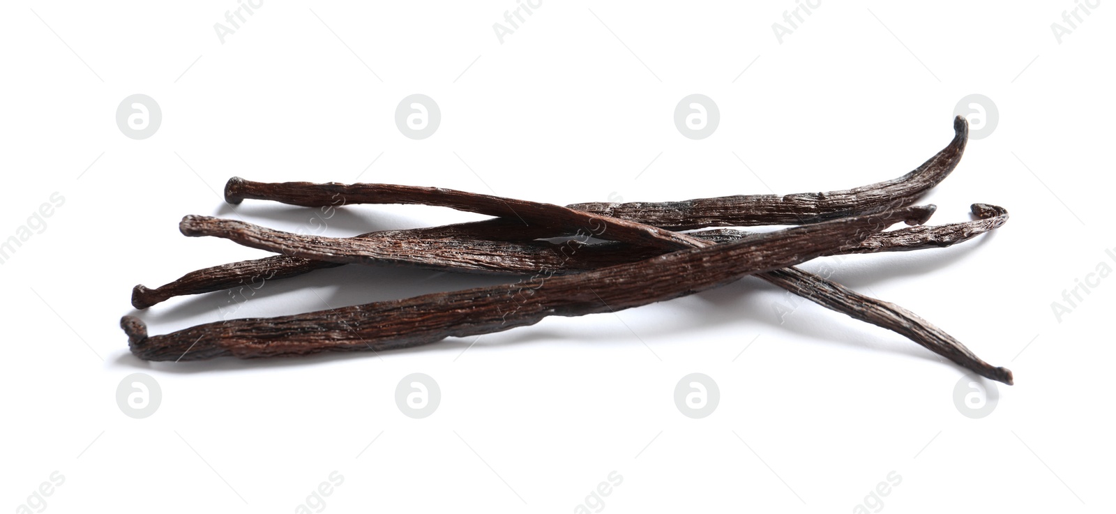 Photo of Aromatic vanilla sticks on white background