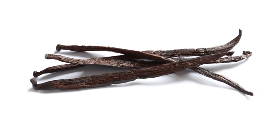 Photo of Aromatic vanilla sticks on white background