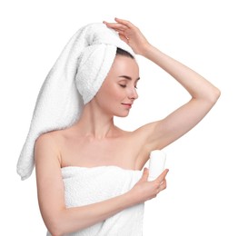 Beautiful woman applying deodorant on white background