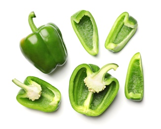 Photo of Whole and cut green bell peppers on white background, top view