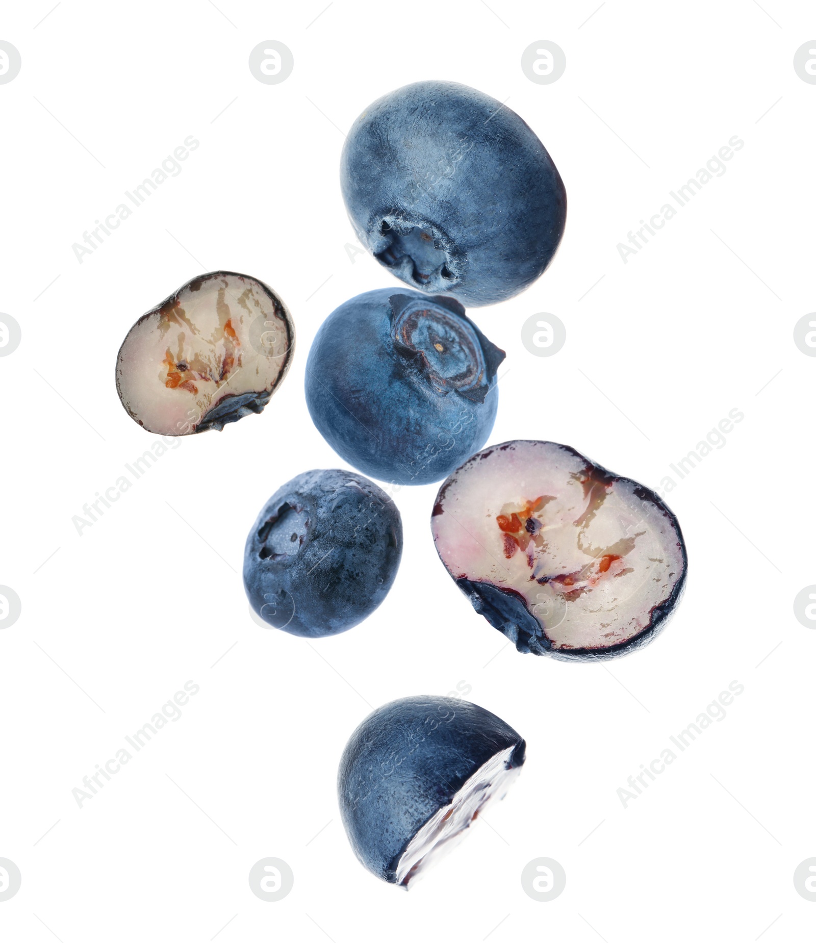 Image of Many fresh ripe blueberries falling on white background