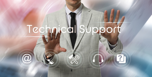 Image of Businessman using virtual screen with different icons, closeup. Technical support service 