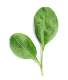 Photo of Fresh green leaves of healthy baby spinach on white background, top view