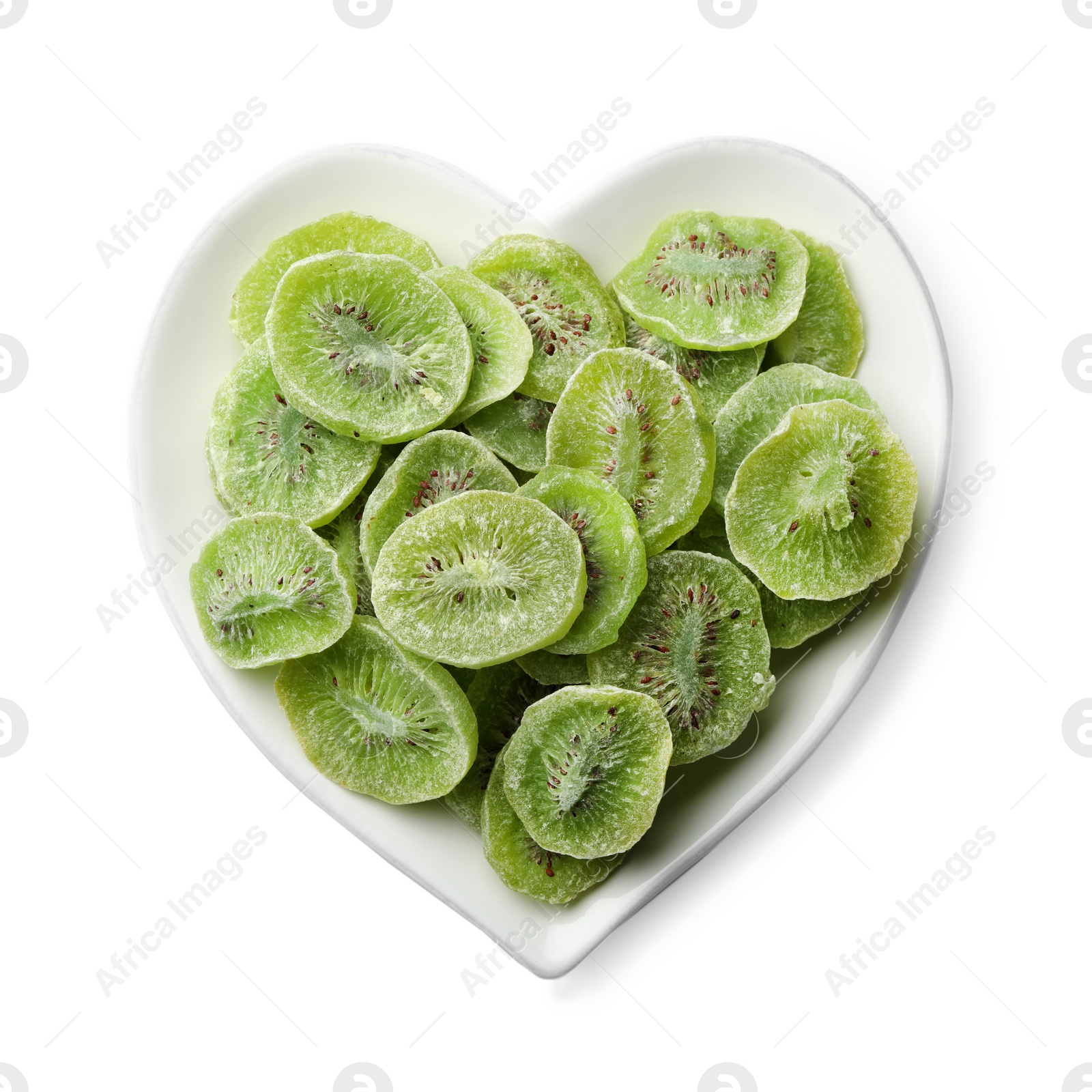 Photo of Plate with slices of kiwi on white background, top view. Dried fruit as healthy food