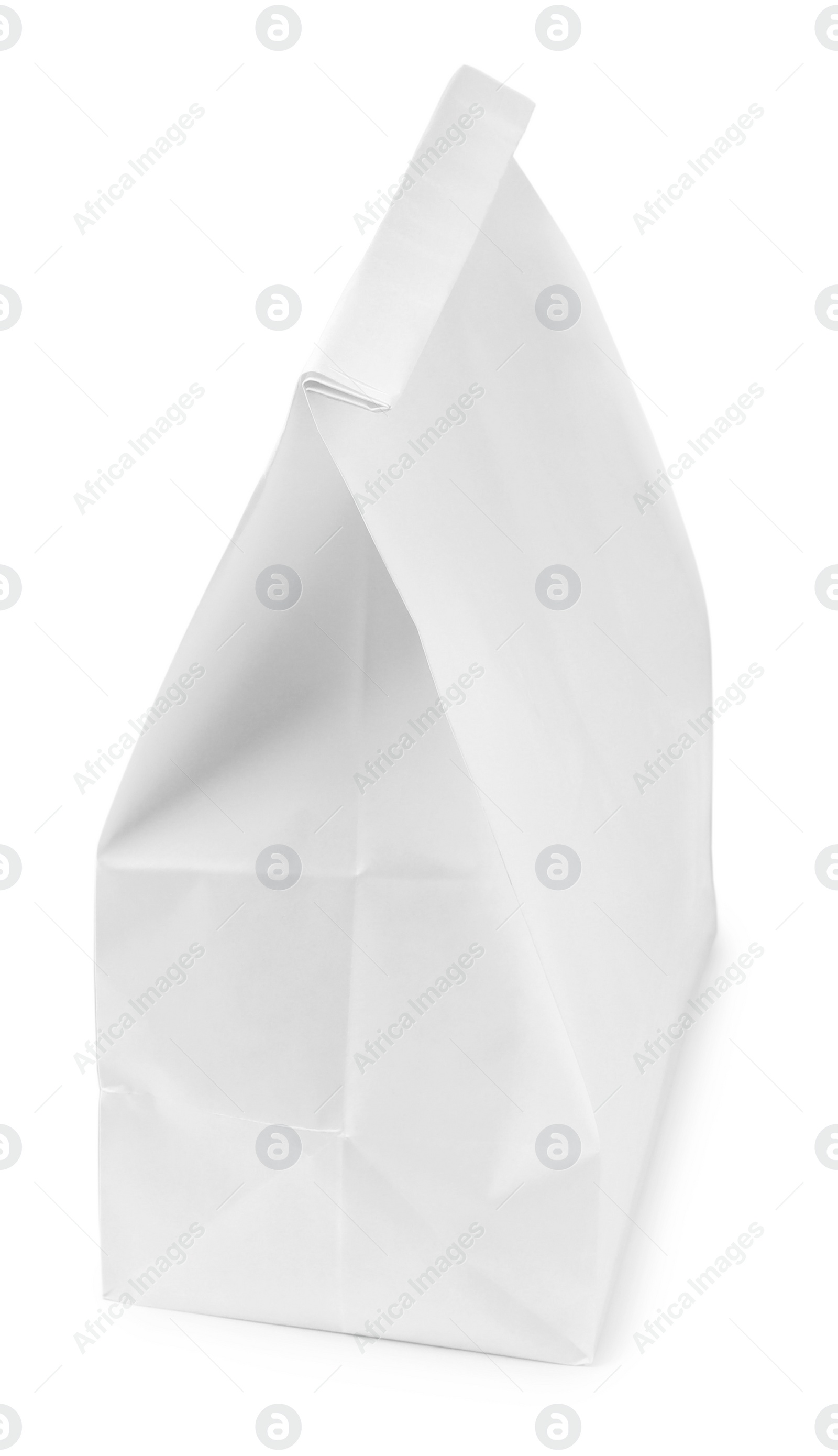 Photo of Closed paper grocery bag isolated on white