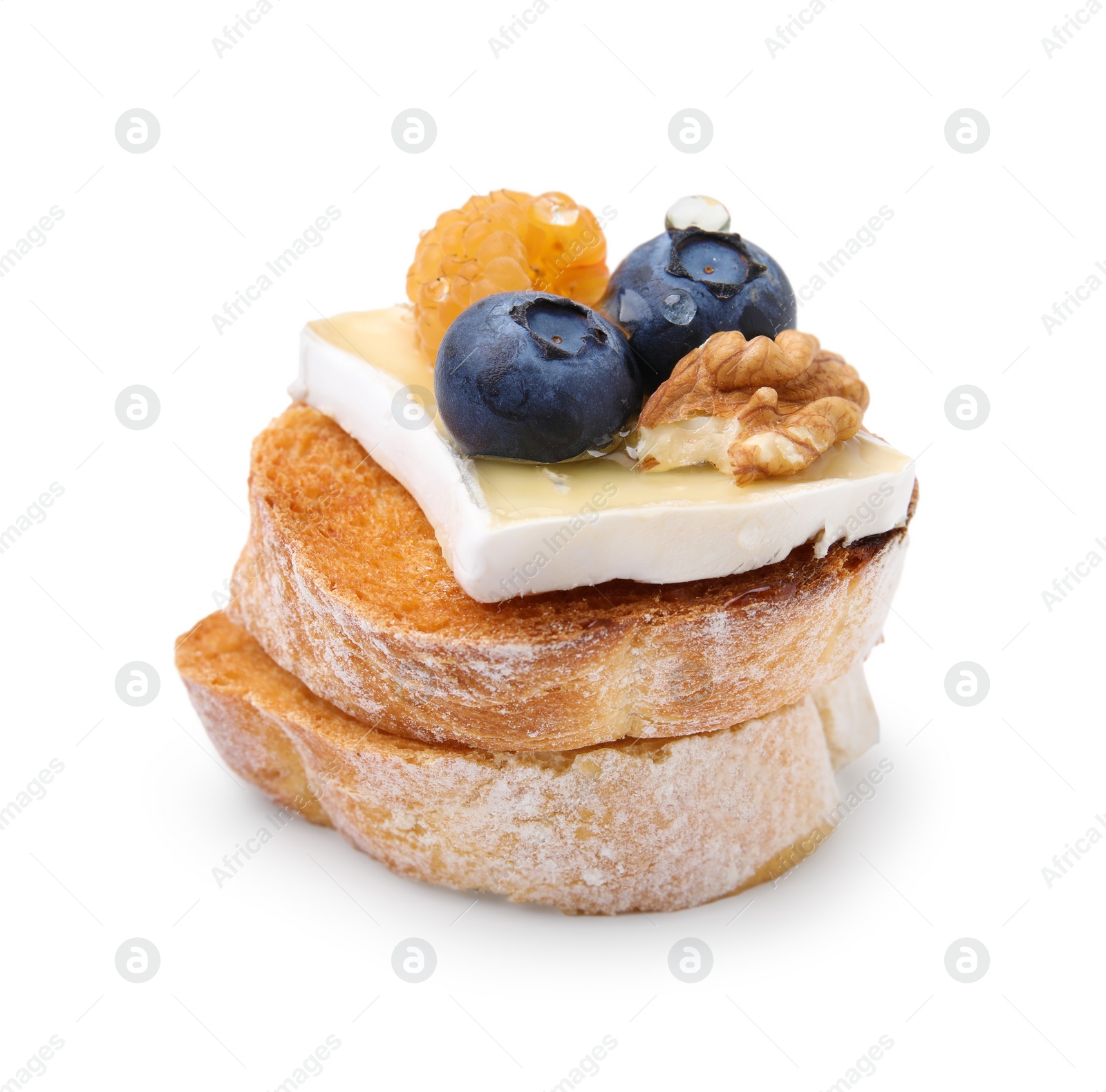 Photo of Tasty sandwich with brie cheese, fresh berries and walnut isolated on white