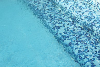 Photo of Outdoor swimming pool with stairs and clear water