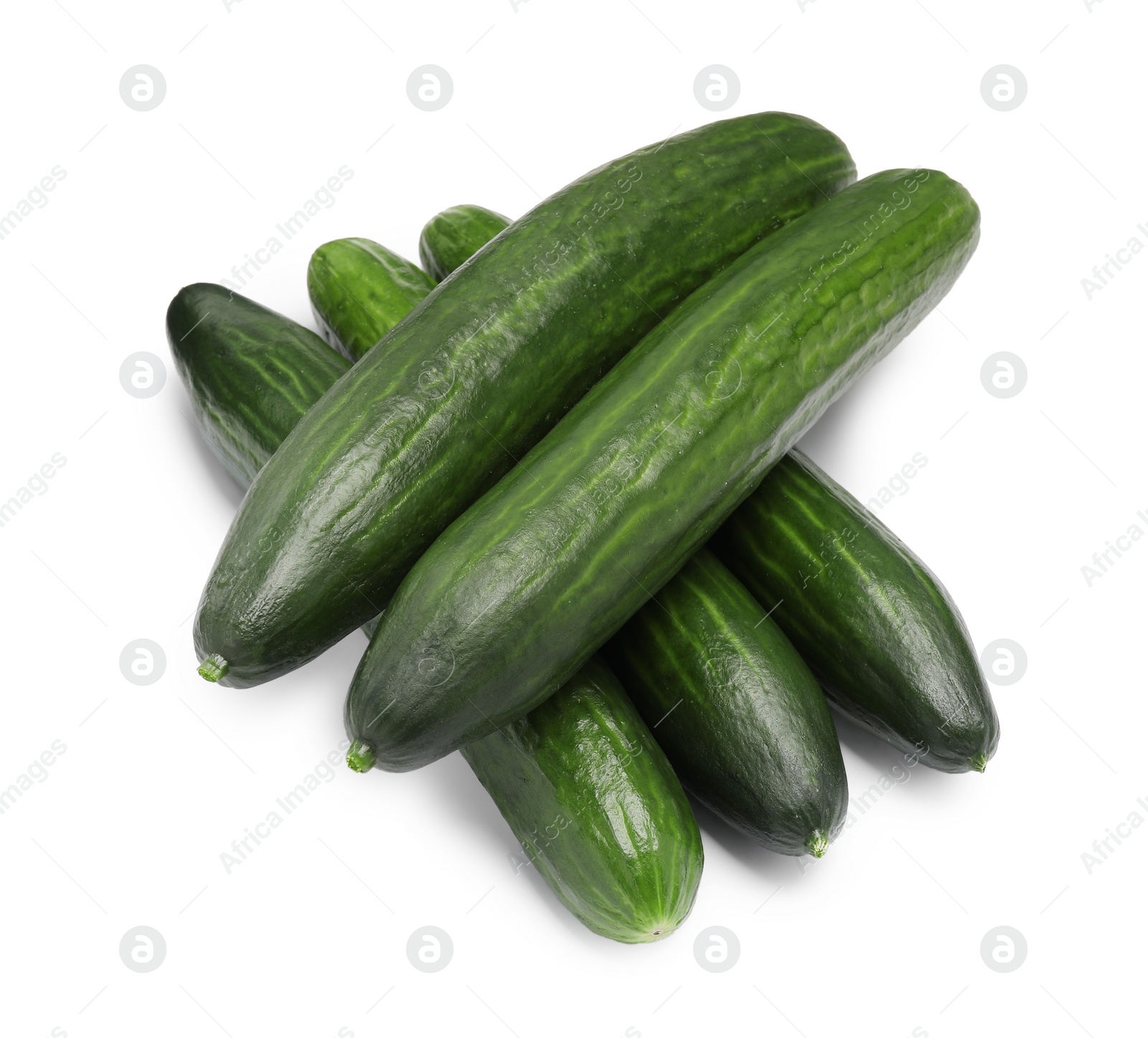 Photo of Many long fresh cucumbers isolated on white